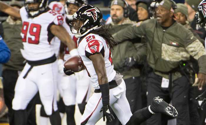 Atlanta Falcons cornerback Desmond Trufant (21) runs back an interception during the first half against the Atlanta Falcons at CenturyLink Field.